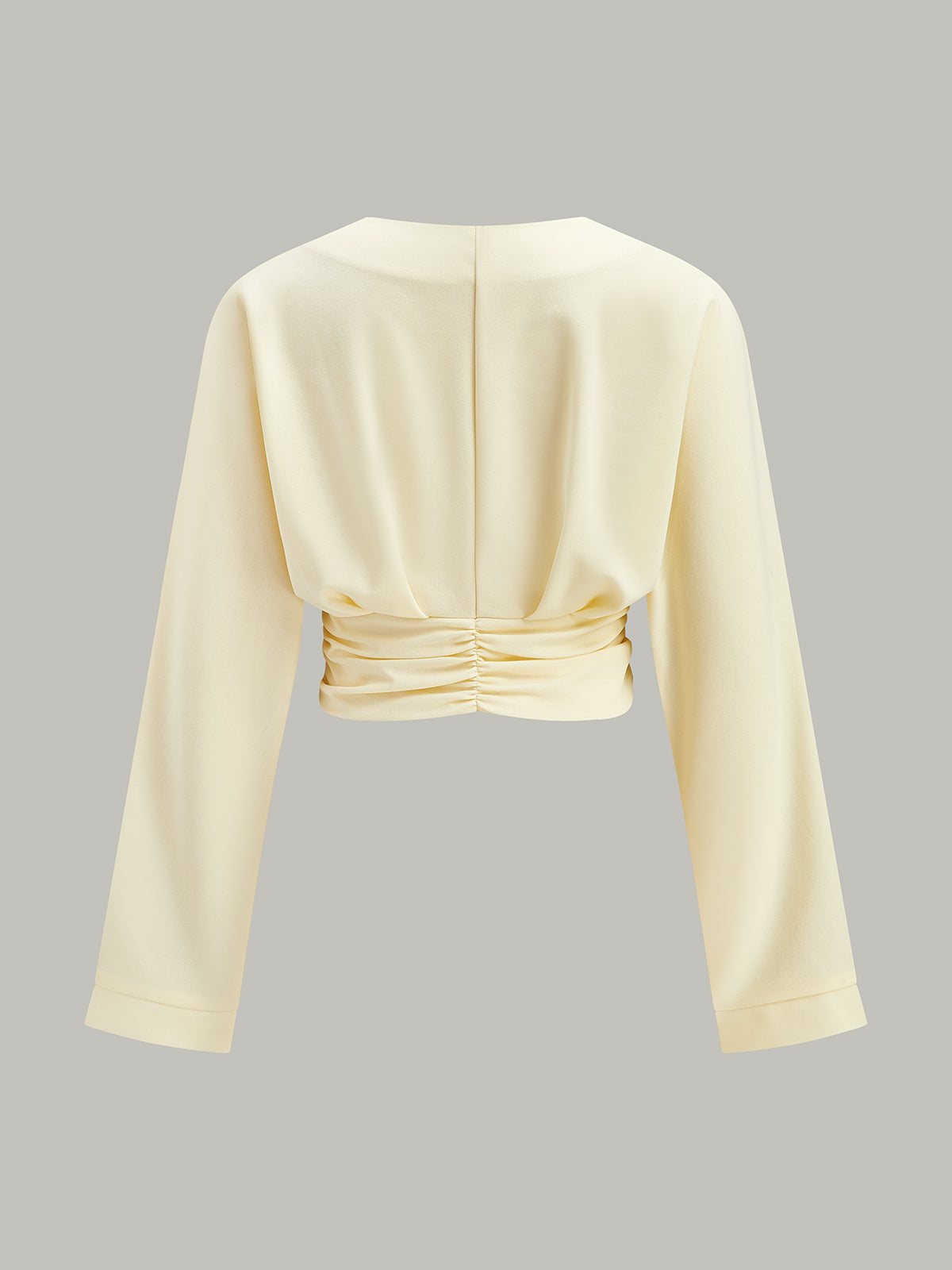 V Yaka Kıvrımlı Bel Dekor Düğmeli Kırpılmış Bluz